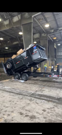 Top Tier trailer tipping debris at a disposal facility